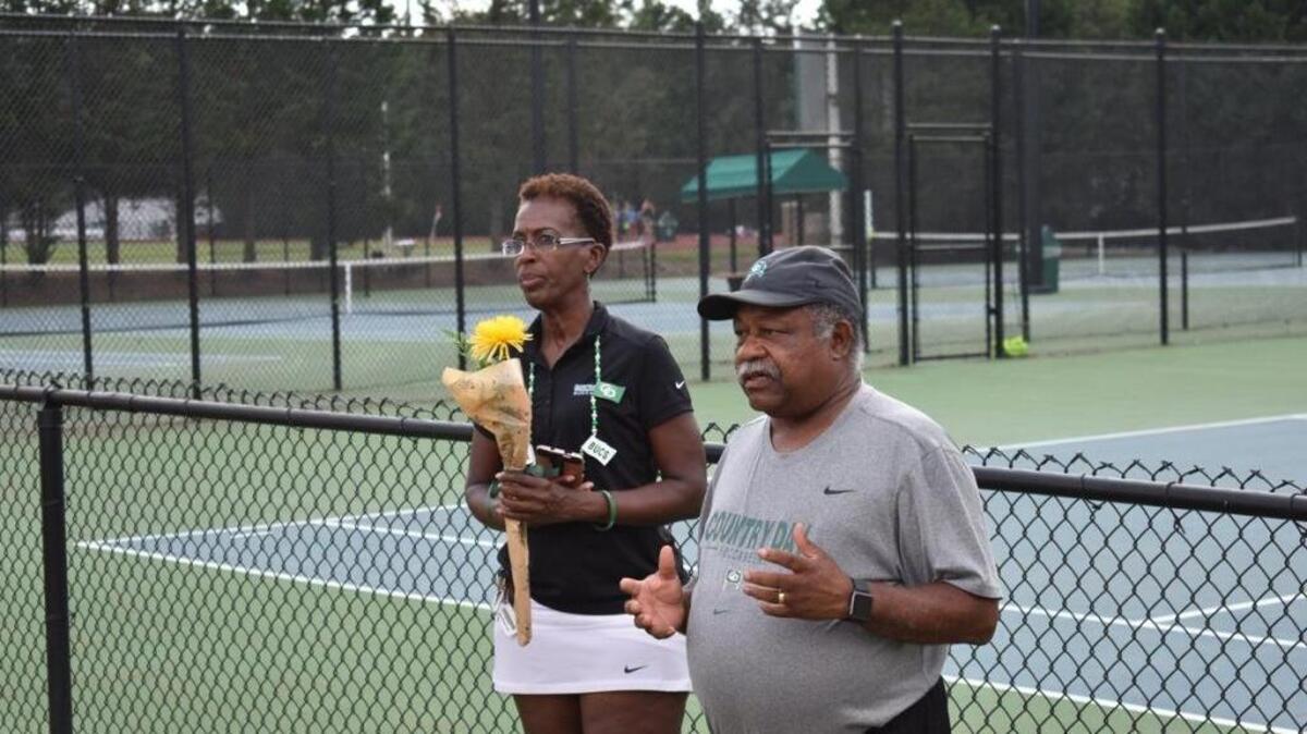 Charlotte Country Day tennis coach Calvin Davis recently received a big coach of the year honor