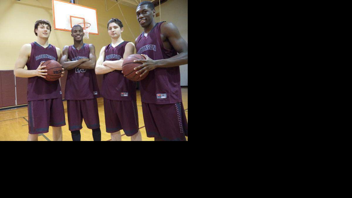 
The Jay M. Robinson boys’ basketball team’s “big four” is, from left, Conner Boothe, Lavar Batts Jr., Jordan McKenzie and Daniel Spencer. The Bulldogs are entering the state playoffs with a winning record for the first time in three years.

