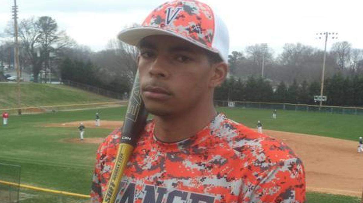 
Vance utility player Zack Morla receives guidance from head coach Rodney Carr.
