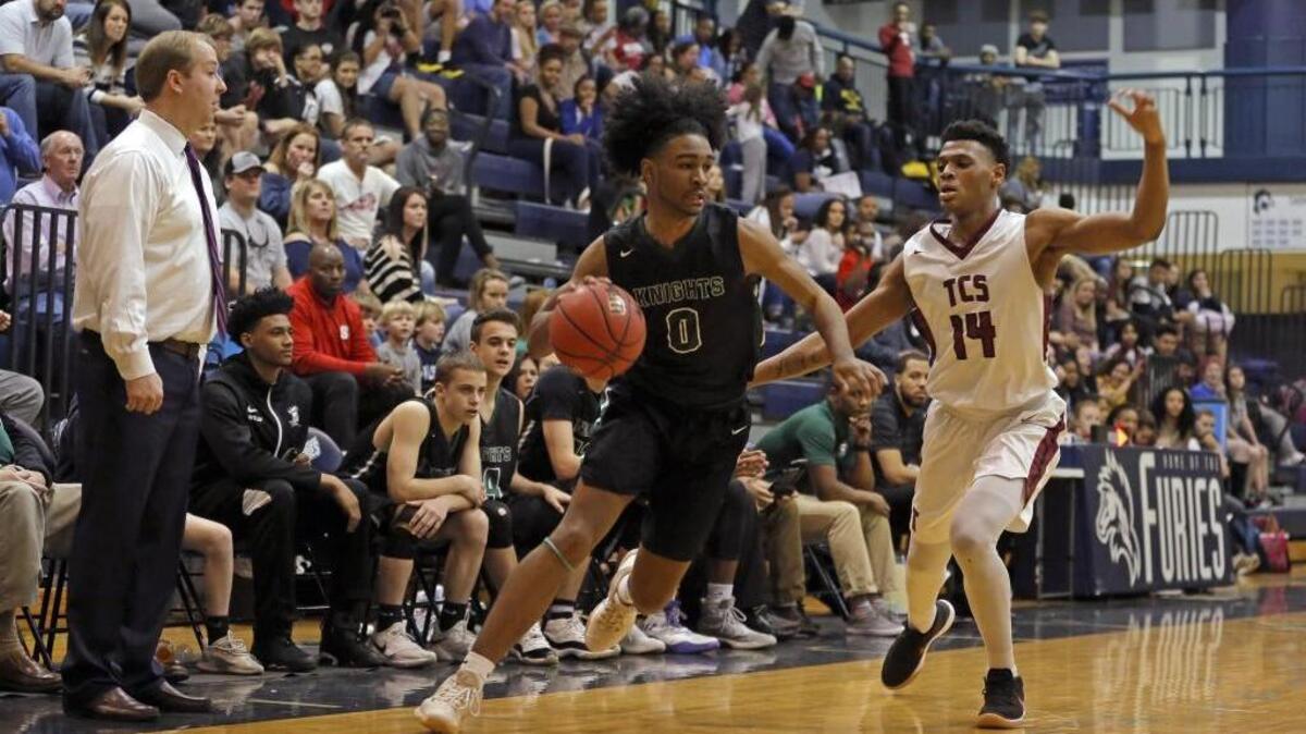 Greenfield's Coby White (0), seen playing in last month’s N.C. Independent Schools state championship game, was named a two-time N.C. Gatorade player of the year Thursday