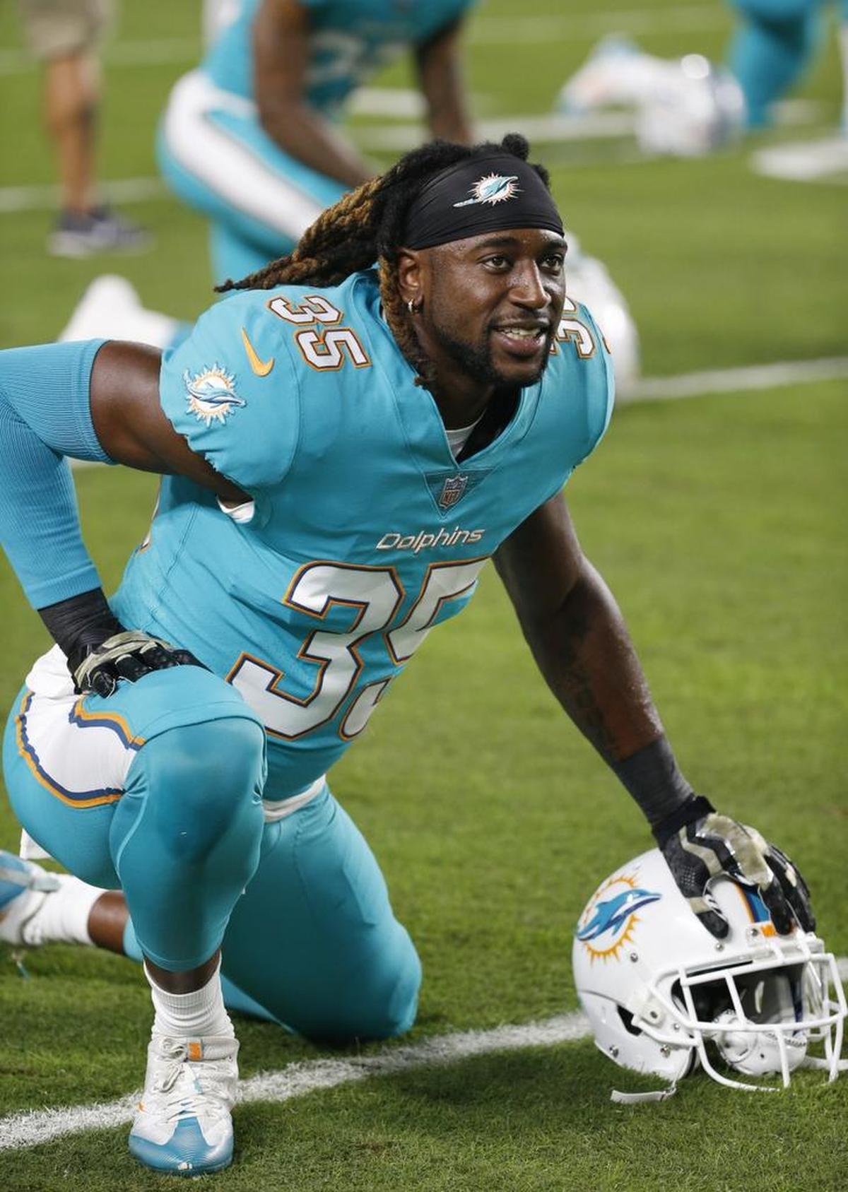Miami Dolphins free safety Walt Aikens (35) is a former three-sport star at Harding High School