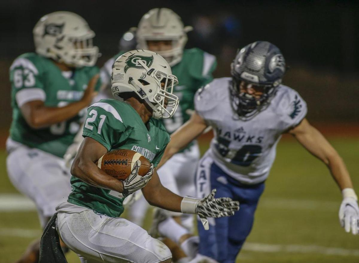 Charlotte Country Day’s Quentin Cooper goes for a run in the 2018 season. In 2020, CISAA schools will only play each other