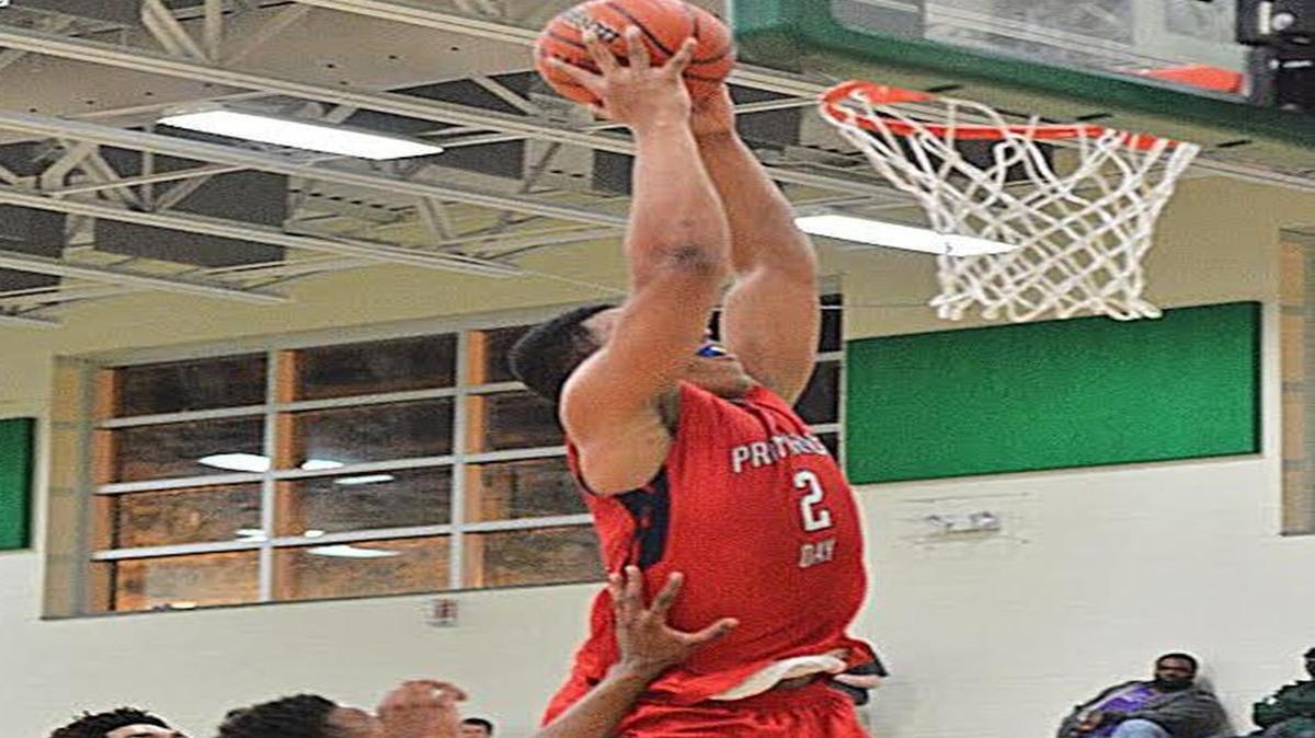 Providence Day’s Grant Williams dunks during Friday’s 84-66 win over Raleigh Word of God at the Charlotte Hoops Challenge