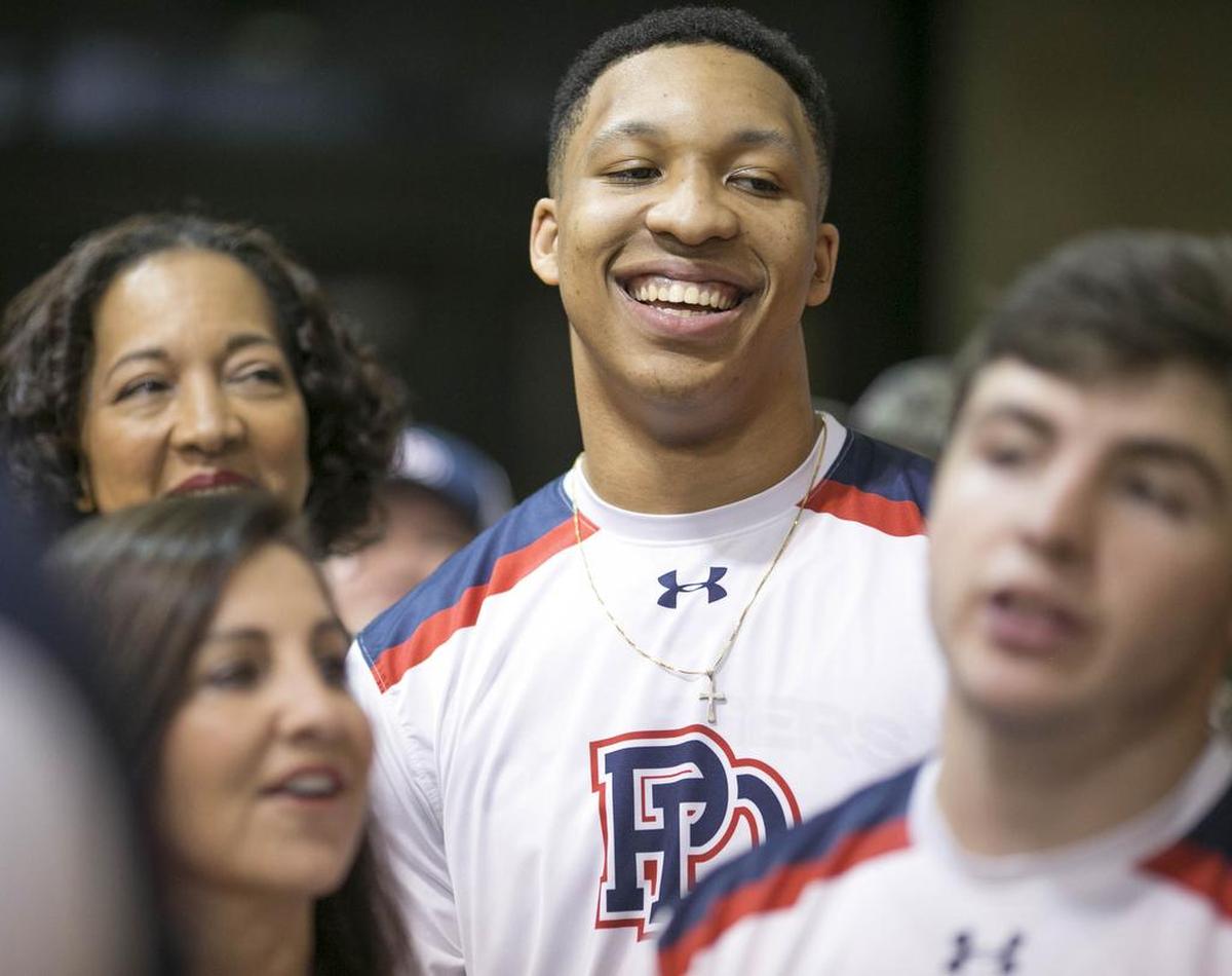 Providence Day’s Grant Williams smiles before being recognized during senior night at a boys prep basketball game Friday, January 5, 2016 at Providence Day. Photo by JASON E. MICZEK - Special to the Observer