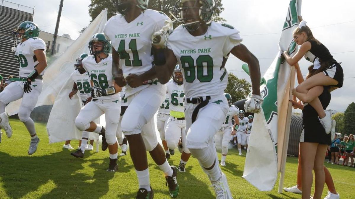 Myers Park Mustangs senior cornerback Randy Logan (41) and junior receiver Emanuel Alston (80) are part of a Mustangs team that’s started the season 3-0 for the first time since 1997.