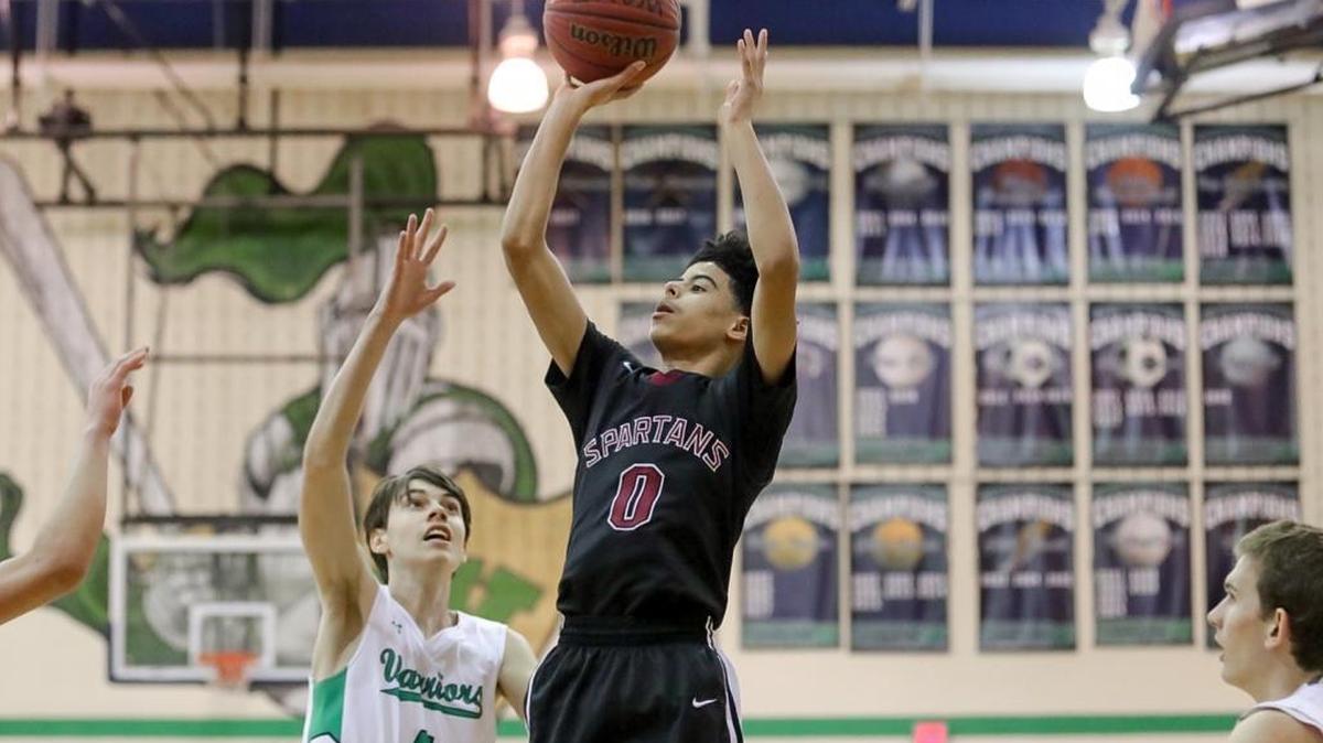 Sun Valley’s Justin Morton pulls up outside of the lane for a basket. Sun Valley would defeat Weddington at the buzzer 48-46.