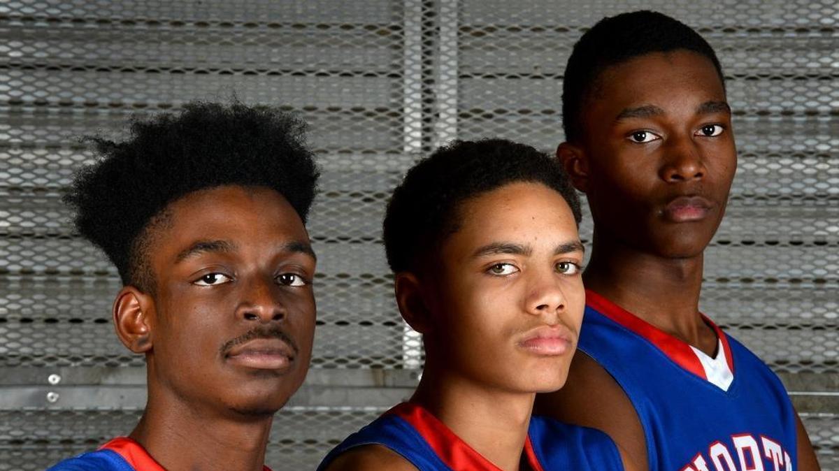 North Meck High's Tristan Maxwell, right, Jae'Lyn Withers, center and Vaud Worthy, left, have a tough game Friday at Berry High. It is the game of the night in the area