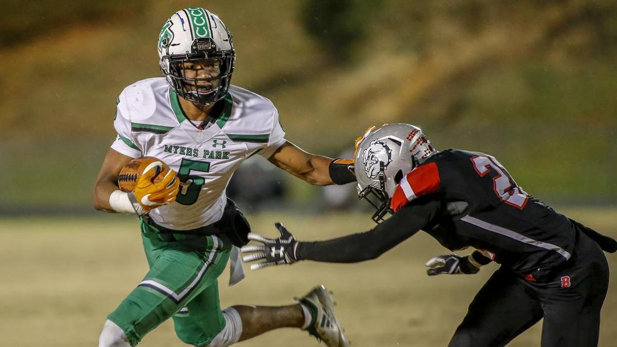 Myers Park wide receiver Moose Muhammad, left, and the Mustangs will visit Richmond Senior on Friday in the third round of the N.C. 4AA football playoffs.