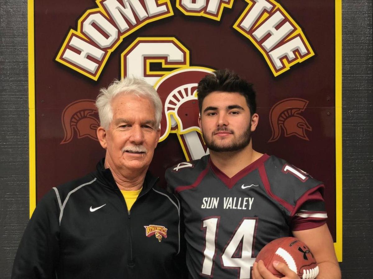 Sun Valley High coach Tad Baucom (left) says Sam Howell is the best quarterback he’s coached in his 37-year career.