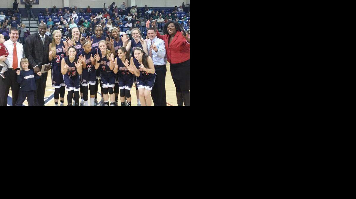 
Providence Day players and coaches celebrates their sixth straight NCISAA 3A state title Saturday in Asheville

