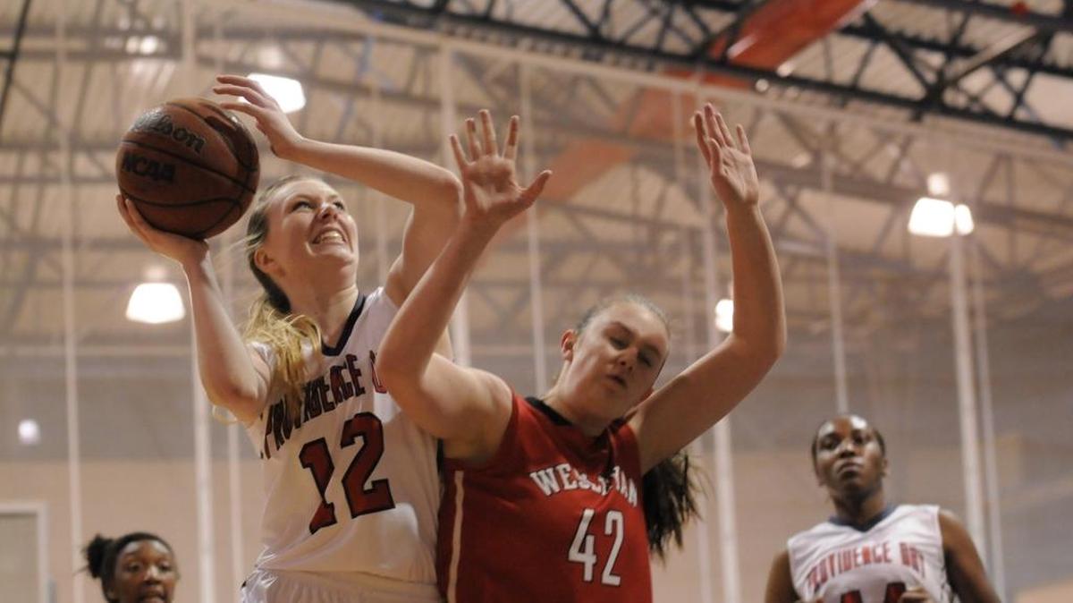 Providence Day’s Erin Whalen (left) is the Associated Press N.C. player of the year. (Mike McCarn / MMP)