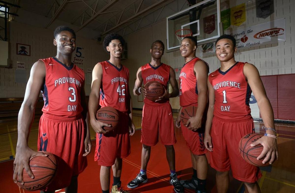 In the 2015-16 season, Providence Day began the season No. 1 in the Sweet 16 with five Division I recruits. The Chargers ended it with a state title while playing one of the toughest schedules in Mecklenburg County history. Providence Day’s boys’ basketball starters - sophomore guard Trey Wertz (3), 6-6 senior forward Joshua Howard (42), 6-8 senior forward Isaac Johnson (22), 6-7 senior center Grant Williams (2) and sophomore guard Devon Dotson (1).