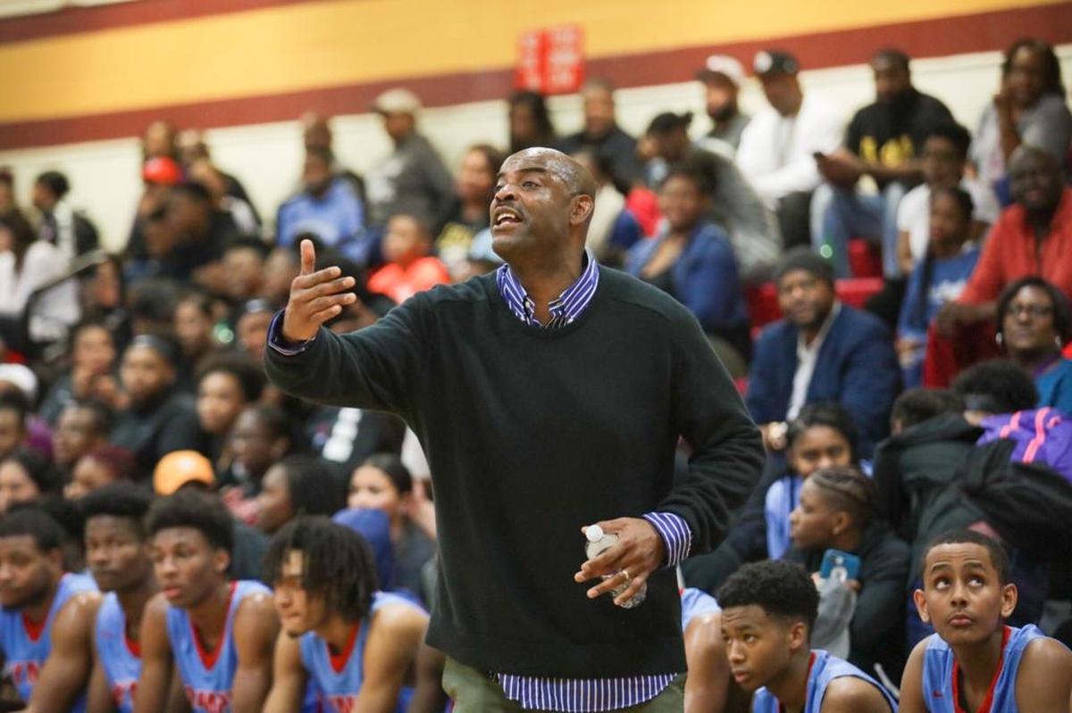 Olympic coach Baronton Terry watches the action in in Friday’s game at Harding.
