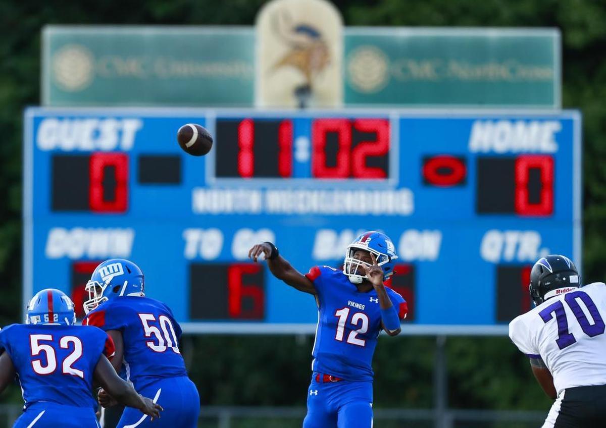 North Mecklenburg quarterback Aaron Scott drops back to pass against Cox Mill last week.