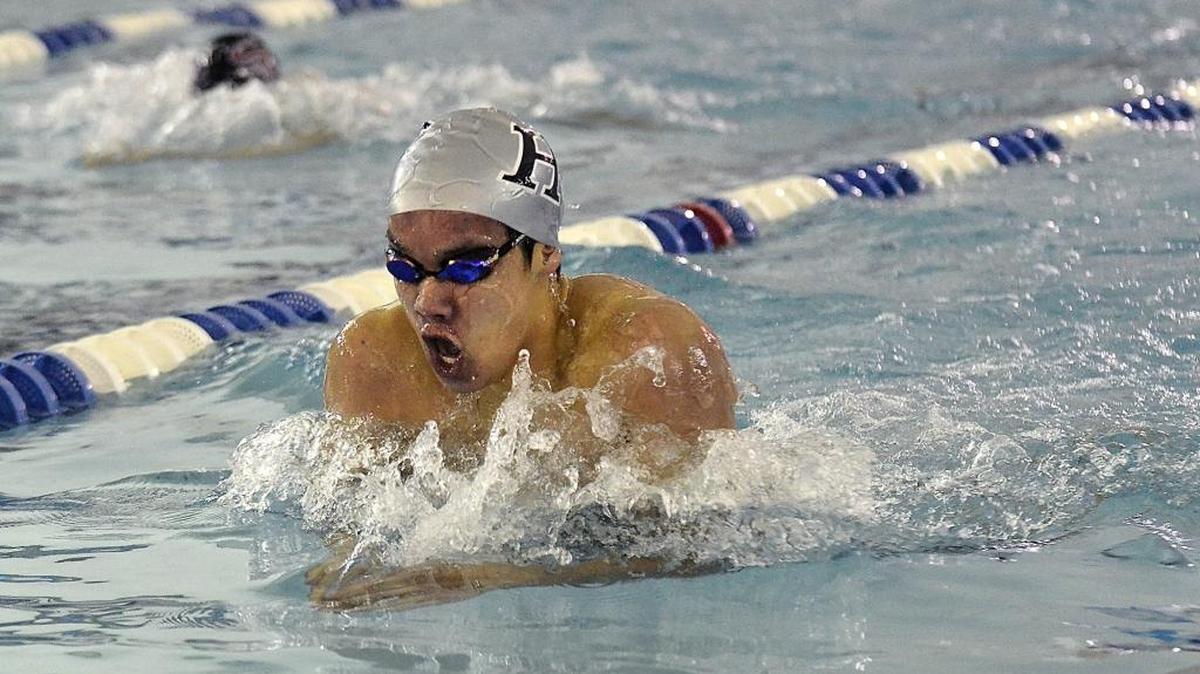 Will Chan, a sophomore at Hough High School swims the breast stroke leg during the third heat of the men's 200 yard IM. Chan won the heat. The NC 4A West regional swimming & NC 3A West regional diving championships were held at Huntersville Family fitness & Aquatic Center on Saturday, Feb.6, 2016.