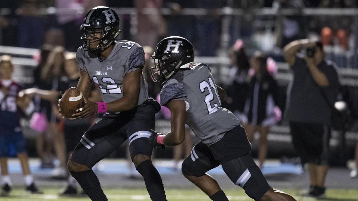 Hough High quarterback Kennique Bonner-Steward (left) and the Huskies play Vance Friday in the N.C. 4AA quarterfinals