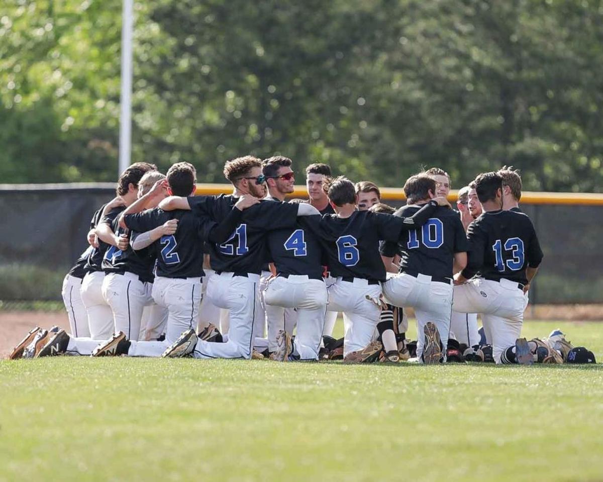 Lake Norman’s baseball team prepare for the start of the 4A I-Meck Tournament Championship Thursday night.
