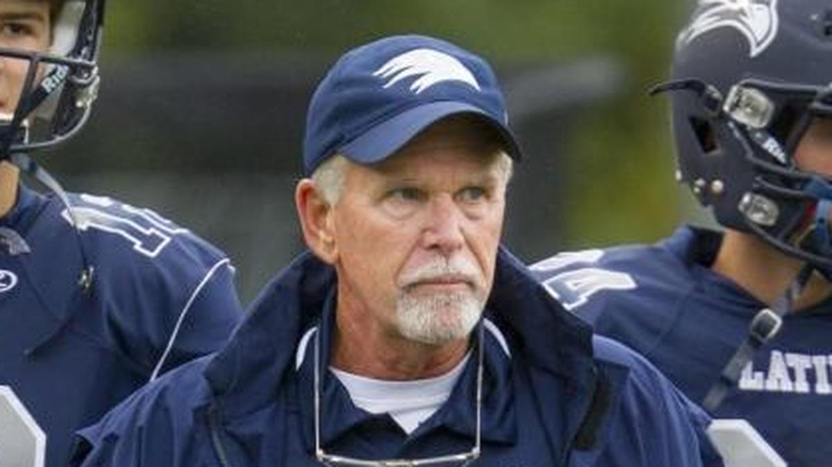 Charlotte Latin’s Larry McNulty, in his final game as the Hawks’ football coach, led the team to the NCISAA Division II championship Friday night. McNulty is retiring after 32 years as the school’s coach.