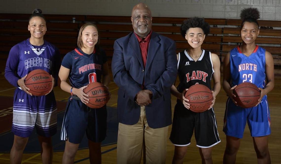 Former Mallard Creek coach Clarence Johnson was The Observer’s Mecklenburg County coach of the year in 2018. Pictured with the All-Mecklenburg girls’ basketball team (left to right): Deniyah Lutz, Ardrey Kell; Kennedy Boyd, Providence Day; Coach Clarence Johnson, Mallard Creek; Jordan McLaughlin, Berry; and Jessica Timmons, North Mecklenburg. Not pictured is Mallard Creek’s Ahlana Smith