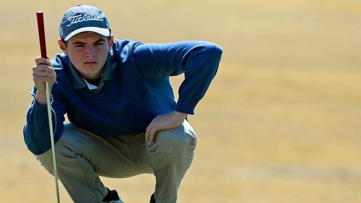 
Myers Park golfer Henry Shimp lines up his putt on the sixth green during the Piedmont Natural Gas High School Championship. Shimp – who tied for ninth at last year’s NCHSAA 4A state tournament – overcame the bumpy greens to take medalist honors for the second straight year. 
