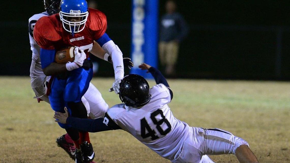 North Meck running back Emanuel Wilson, center, rushed for 301 yards in a shutout win over Cox Mill Friday
