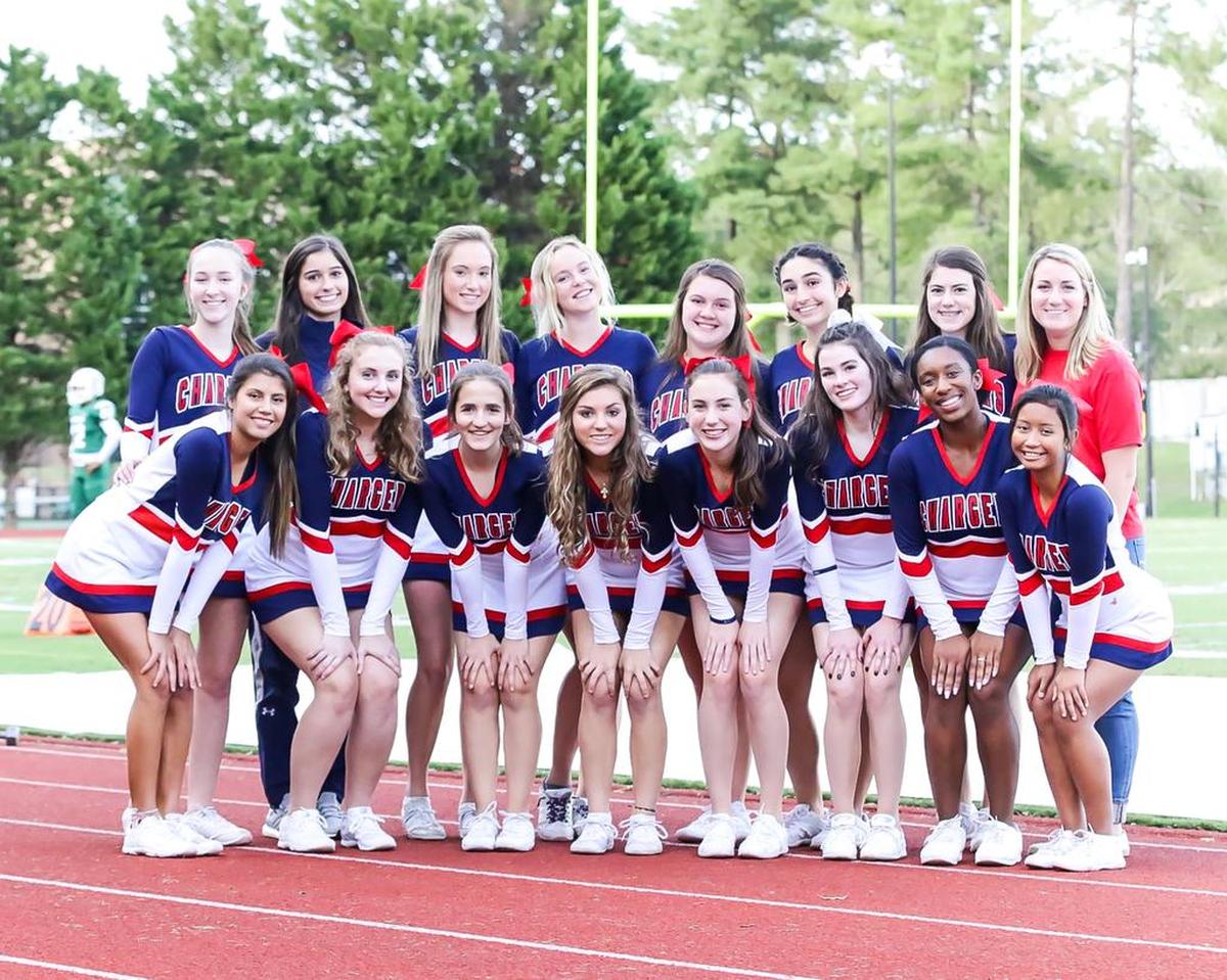Providence Day’s cheerleaders pose during Friday’s game with Charlotte Country Day.