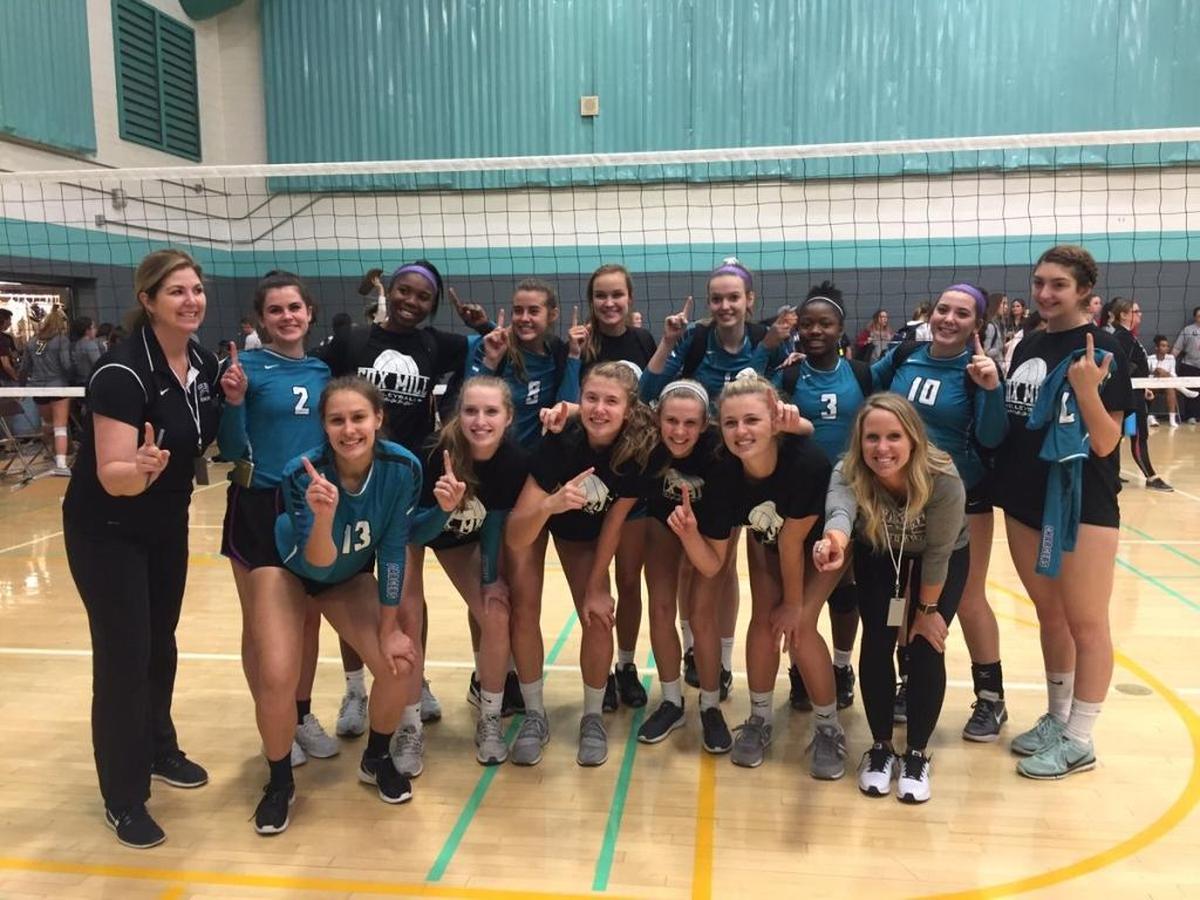 Cox Mill’s volleyball team finished unbeaten in South Piedmont 3A play this season. The Chargers are defending state champs
