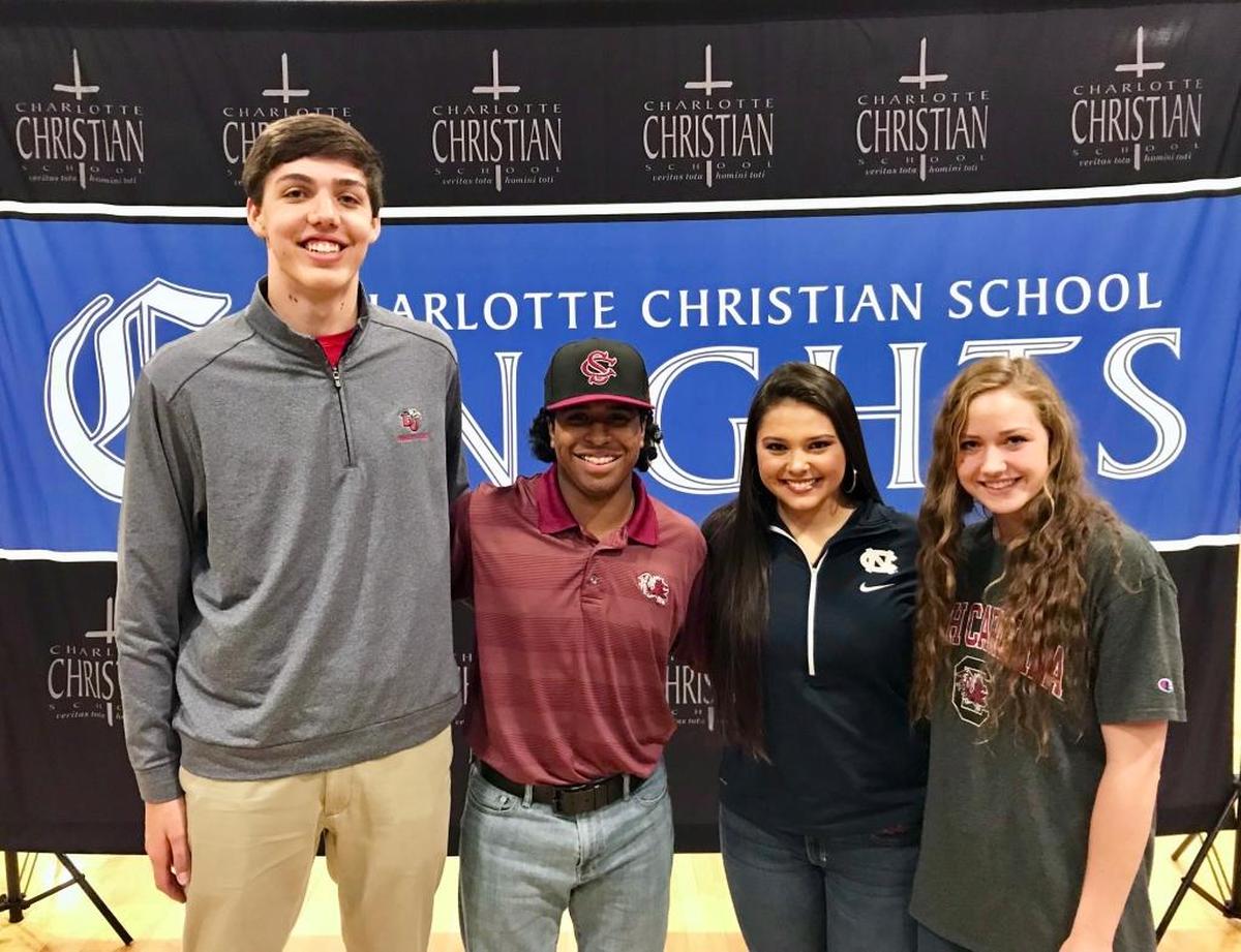National Signing Day at Charlotte Christian: (L-R) Blake Preston (Liberty University, men's basketball); Jonah Beamon (University of South Carolina, baseball); Hannah Faulkenberry (University of North Carolina at Chapel Hill, softball); Rachel Lee (University of South Carolina, swimming)