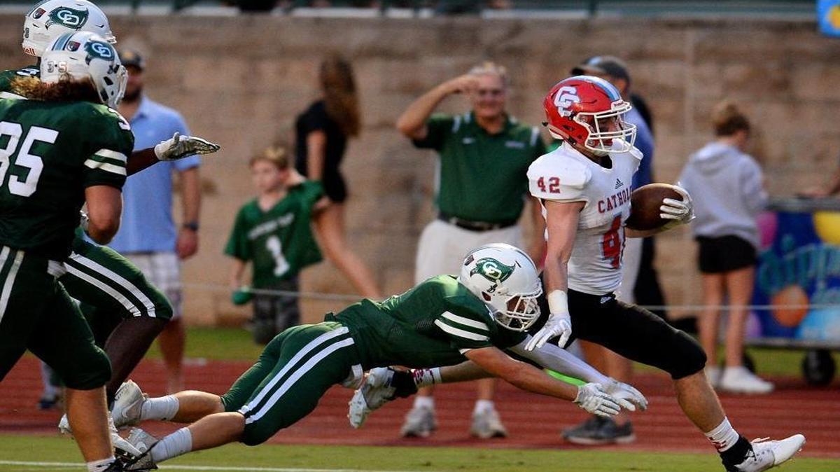 Charlotte Catholic’s Michael Neel, right, rushes into the end zone for a touchdown against Charlotte Country Day during first-quarter action in Friday’s Cook Cup game.