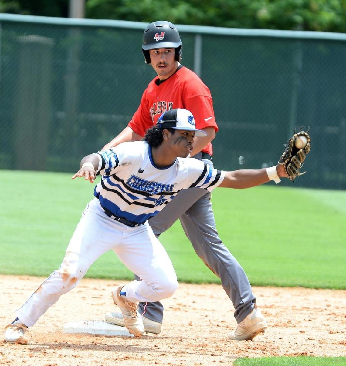 Charlotte Christian #4 Jonah Beamon tries to stop Wesleyan Christian Academy #6 Jackson Prillaman at second base during Saturday's championship baseball game. Wesleyan Christian Academy defeated Charlotte Christian in the NCISAA 3A state championship baseball game at Charlotte Country Day Saturday afternoon.