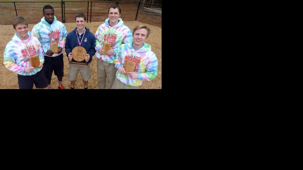 
SouthLake Christian wrestlers, from left, Adam Edwards, D.J. Wilson, Hamilton Hewitt, Hunter Allen and Dylan Boone hold their trophies from the NCISAA state wrestling tournament. SouthLake finished second in the team standings, but five Eagles wrestlers won individual weight class titles.
