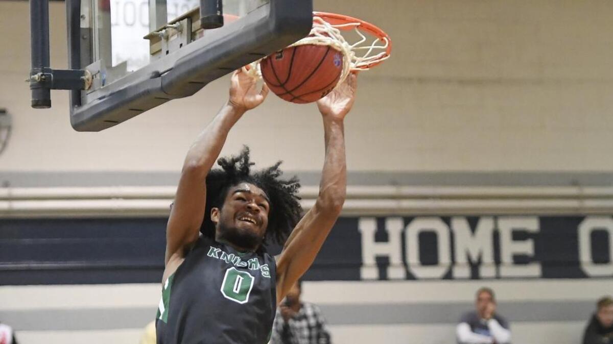 McDonald’s All-American Coby White (0) of Wilson Greenfield High was named the N.C. Associated Press high school player of the year