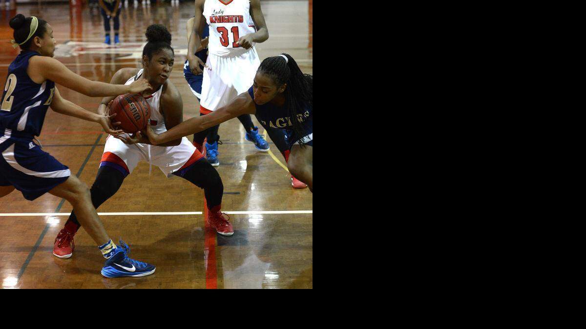 
Northside Christian Ja'Yon Leak (3) scored five points and had three rebounds in a 58-55 loss to 5-time NCISAA state champion Carolina Day in the 2015 state final Saturday
