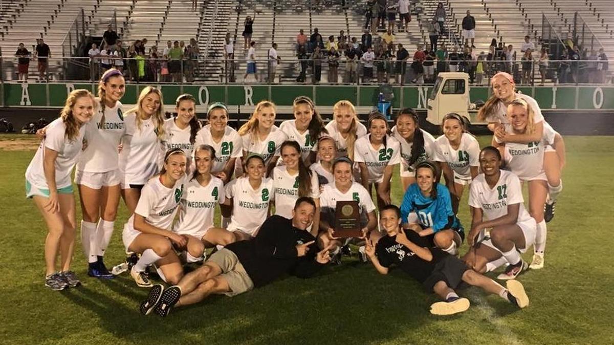 Weddington girls soccer team celebrates winning the N.C. 3A Western Regional championship Tuesday