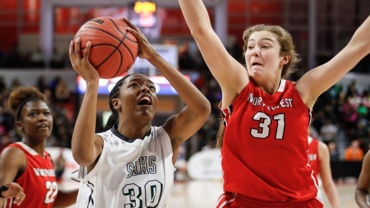 Northwest Guilford's Elizabeth Kitley (31) led her team to the N.C. 4A state championship last year over Southeast Raleigh. She’s one of the Carolinas top college basketball recruits