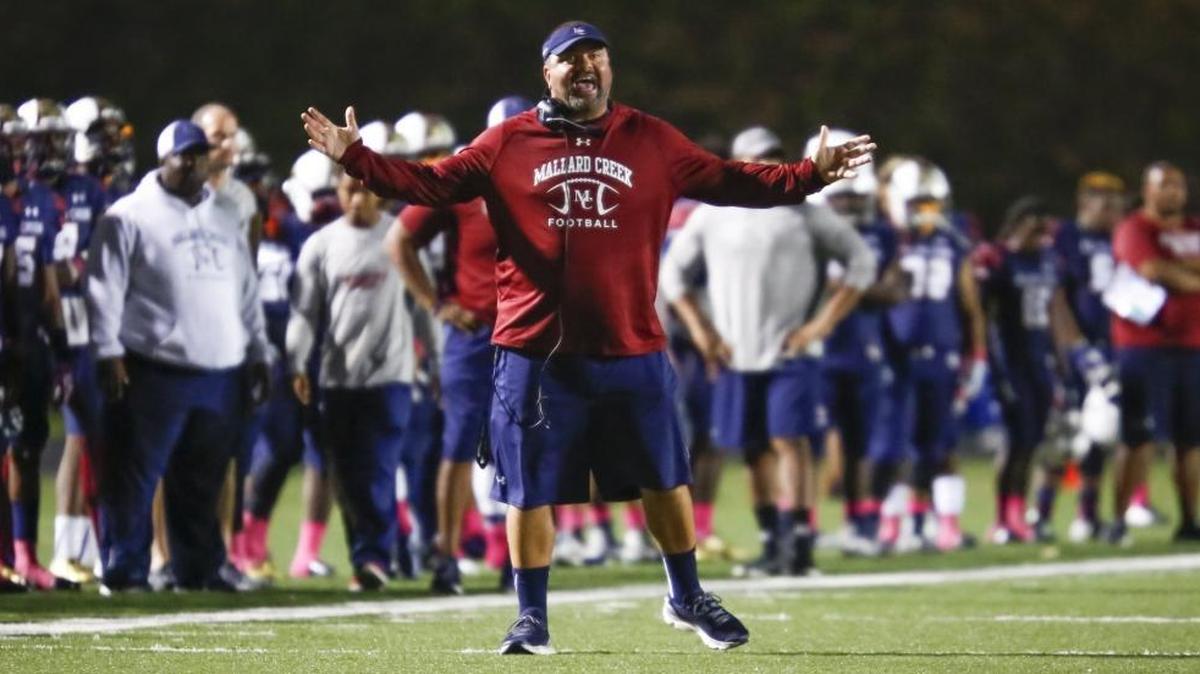 Mallard creek head coach Mike Palmieri questions an official's call while facing Hough High during a MECKA 4A high school football game Friday, October 9, 2015 at Mallard Creek High School in Charlotte, NC. Photo by JASON E. MICZEK - Special to the Observer