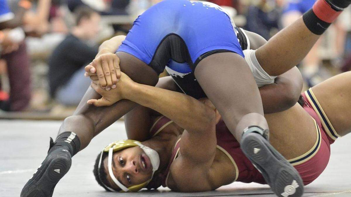In a match of 182 lb. wrestlers Mallard Creek's Derrick Knox looks to control Mooresville's Juan Willis. Willis went on to win by pin. The NCHSAA 4A Western regional wrestling is Saturday, Feb. 13, 2016 at Hough High School.