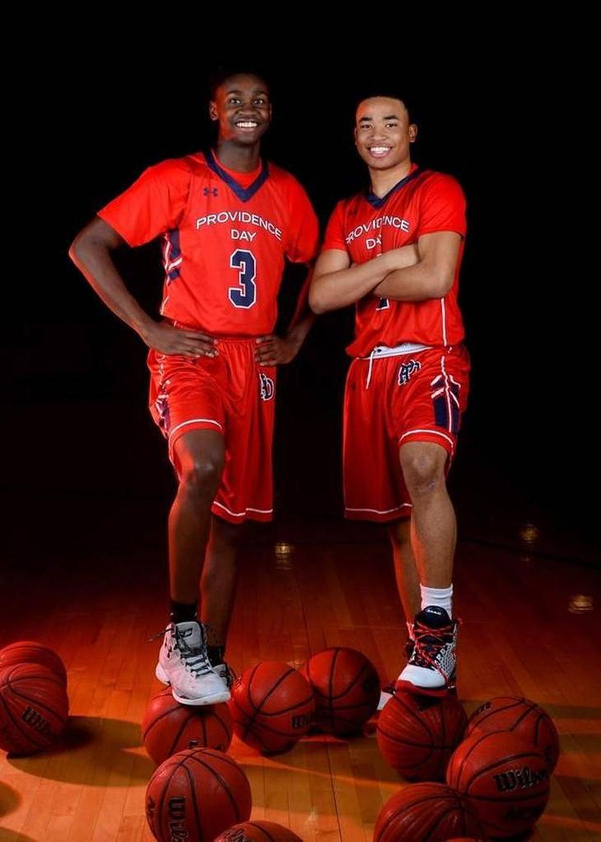 Providence Day all-state boys basketball players Trey Wertz (left) and Devon Dotson