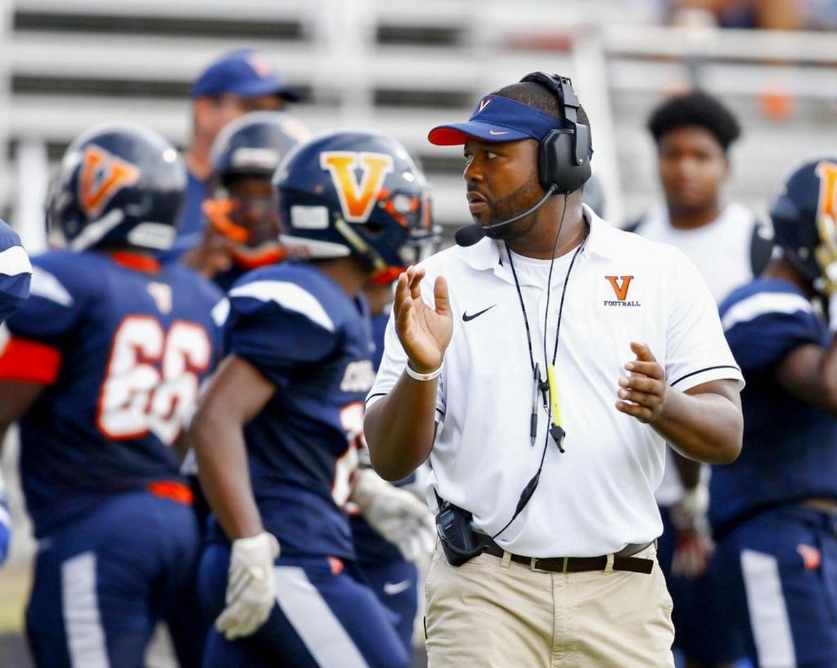 Vance coach Aaron Brand readies for Friday’s kickoff against Rocky River.