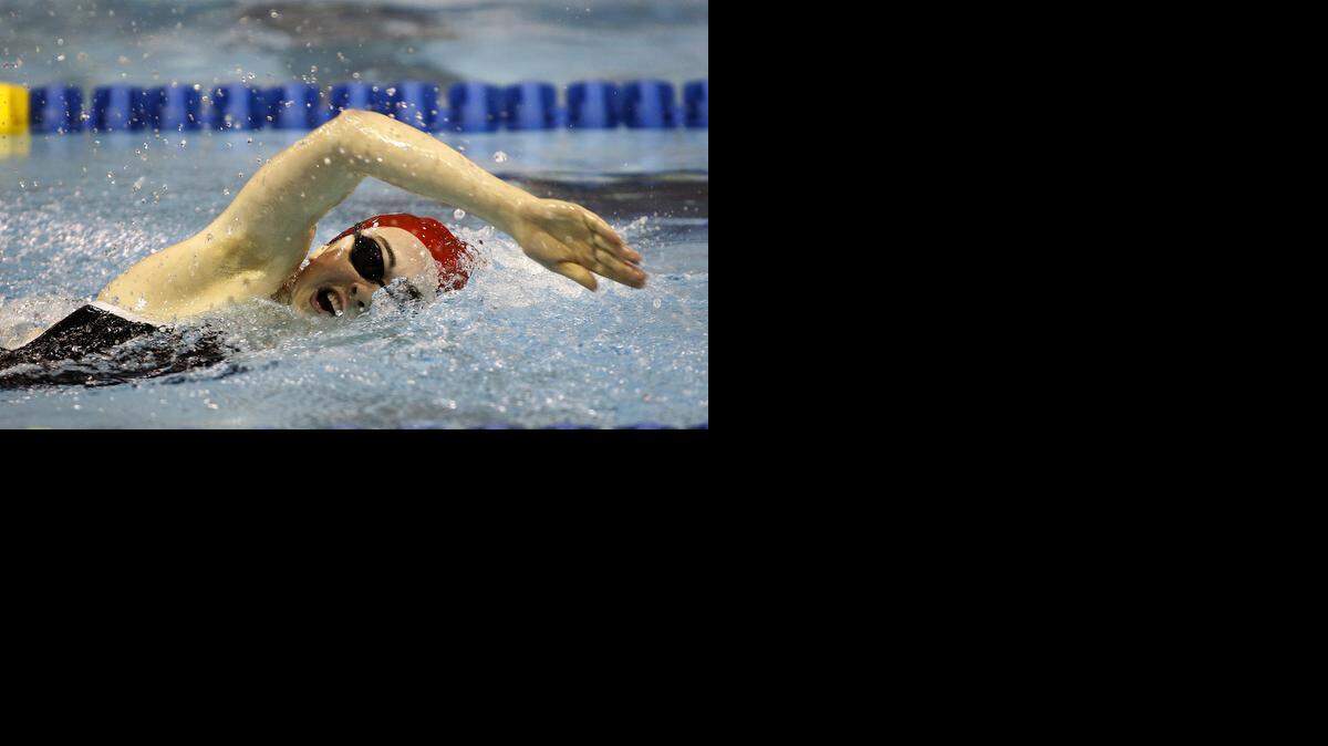 
Charlotte Catholic's Nora McCullagh swims the freestyle leg of the girls 200 yard IM at the SoMeck 8 swimming meet at uptown MAC Friday, Jan. 16, 2015 in Charlotte. McCullagh won the event with a time of 2:06.81. (Nell Redmond photo)
