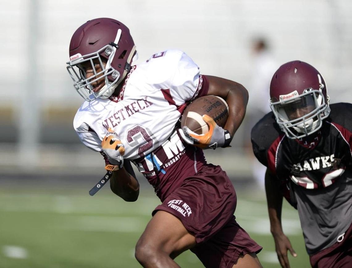 West Meck's Dyami Brown (2, left) is a North Carolina commit.