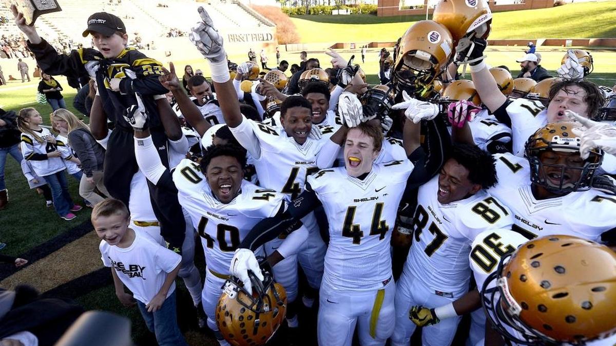 Shelby High celebrated after winning the 2016 state championship. In 2018, the Golden Lions enter the playoffs on a win streak in their chase to win another.