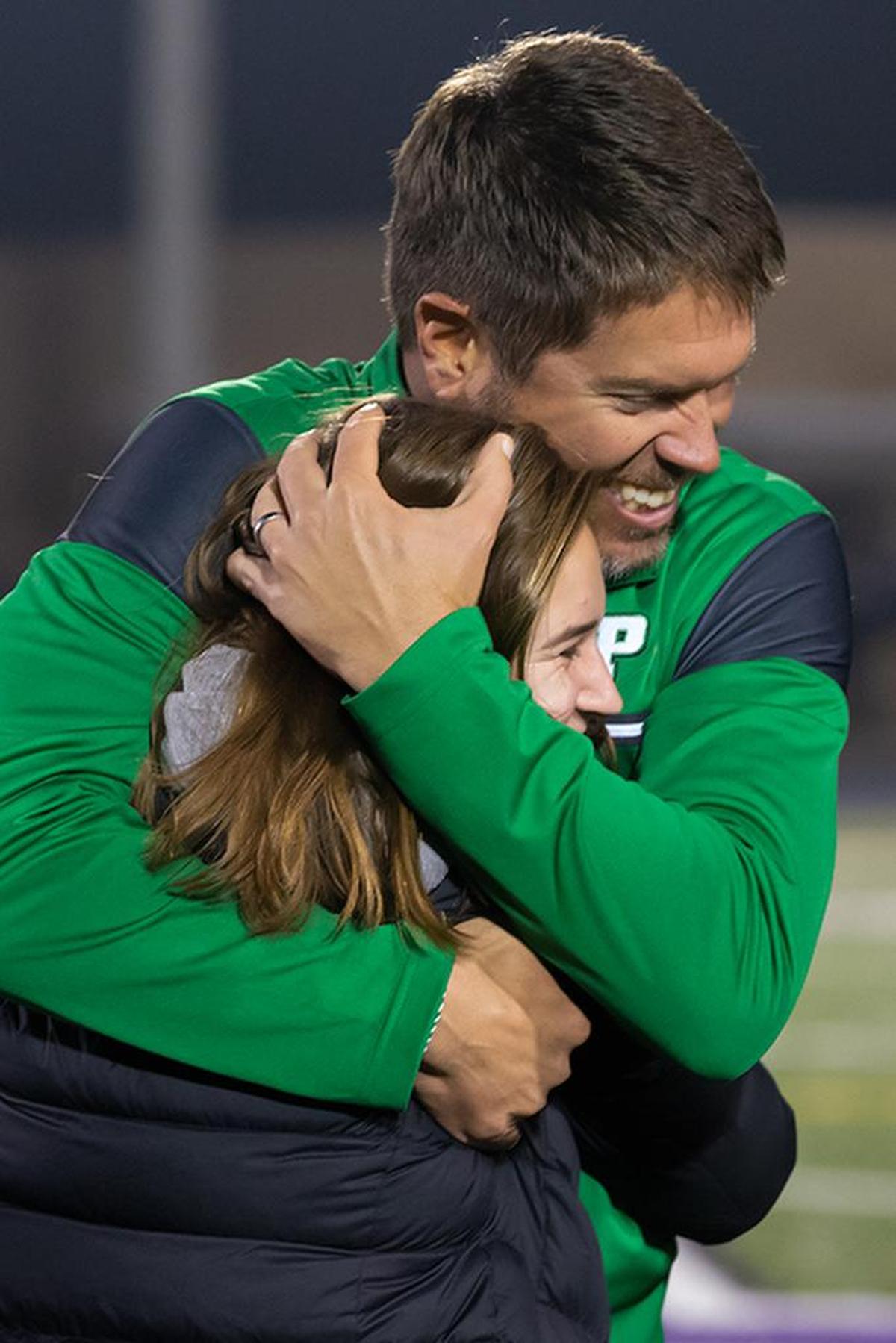 Myers Park Head coach Bucky McCarley celebrates his team’s victory over South Meck.