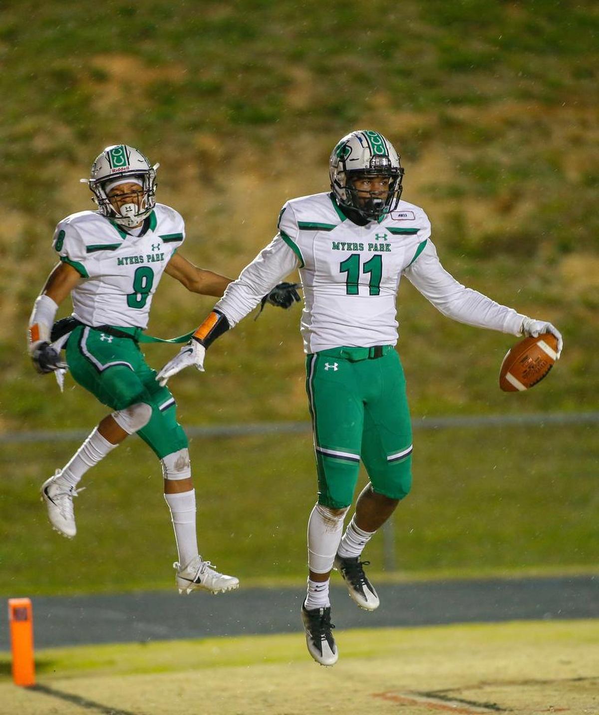 Myers Park receivers Elijah Bowick, right, and receiver Andre Francois celebrate after Bowick scored a touchdown against Butler on Friday.