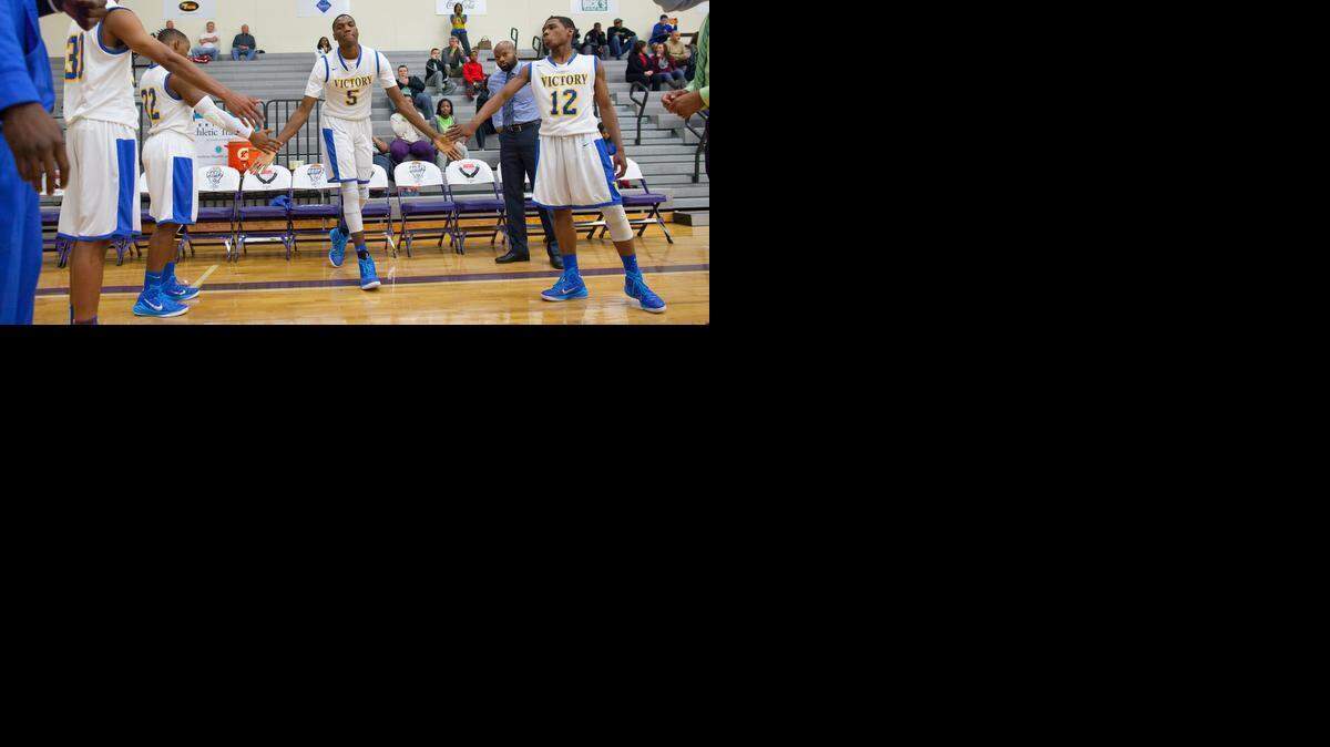 
Victory Christian's Ebuka Izundu (center) had 10 points, 16 rebounds and six blocks in the N.C. Independent Schools quarterfinal win in Asheville Thursday. Photo by JASON E. MICZEK - Special to the Observer
