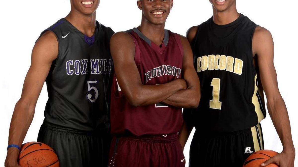 Cox Mill's Wendell Moore, from left, JM Robinson's Lavar Batts and Concord's Rechon Black have drawn offers from some of the best college basketball programs in the nation.