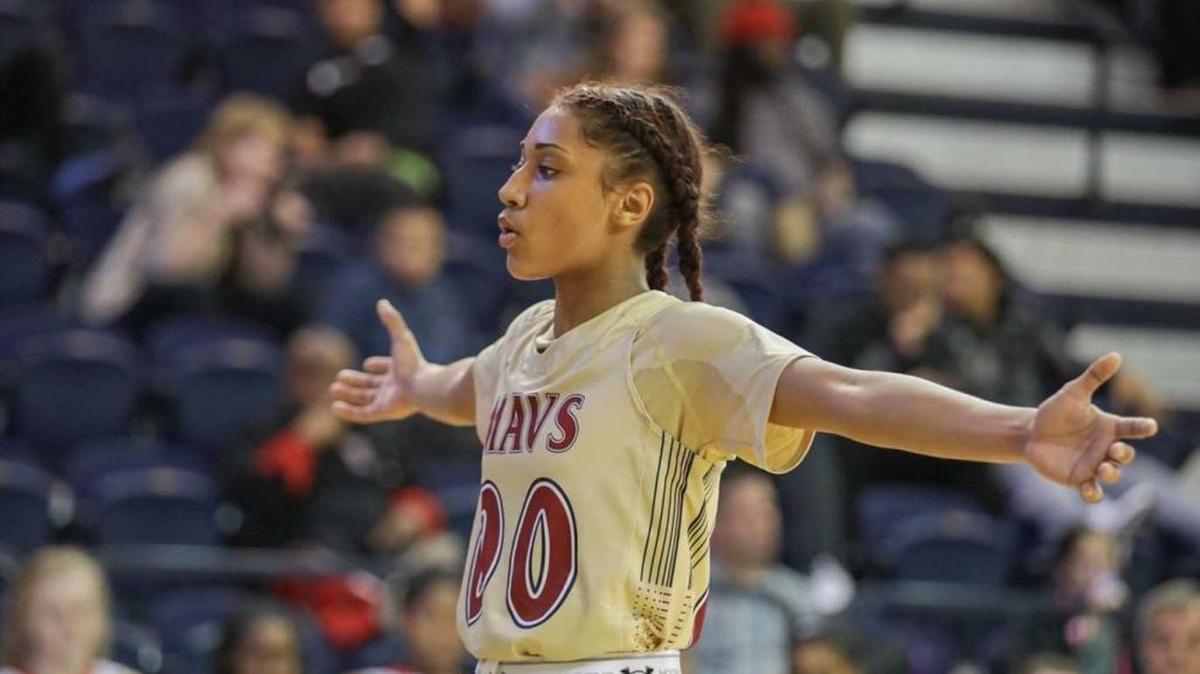 Mallard Creek's Ahlana Smith (00) guards the baseline during late first half action. Northwest Guilford advances to the 4A Women's Final defeating Mallard Creek 61-50.
