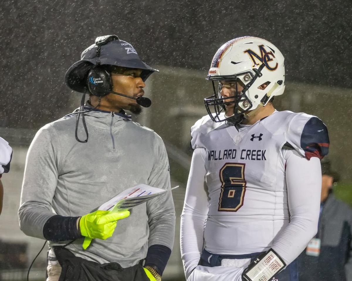 Mallard Creek offensive coordinator DJ McFadden, left, and QB Casey Kelly have helped transform a Mavericks offense that was averaging about 31 points per game over the last two seasons. Mallard Creek is averaging nearly 50 per game in 2018.
