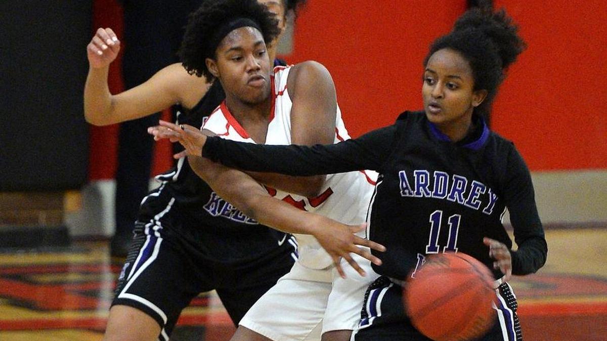Ardrey Kell’s Journey Muhammad, right, led her team, No. 1 in the Sweet 16, past A’Lea Gilbert of South Meck (center) and her No. 5 ranked Sabres Tuesday
