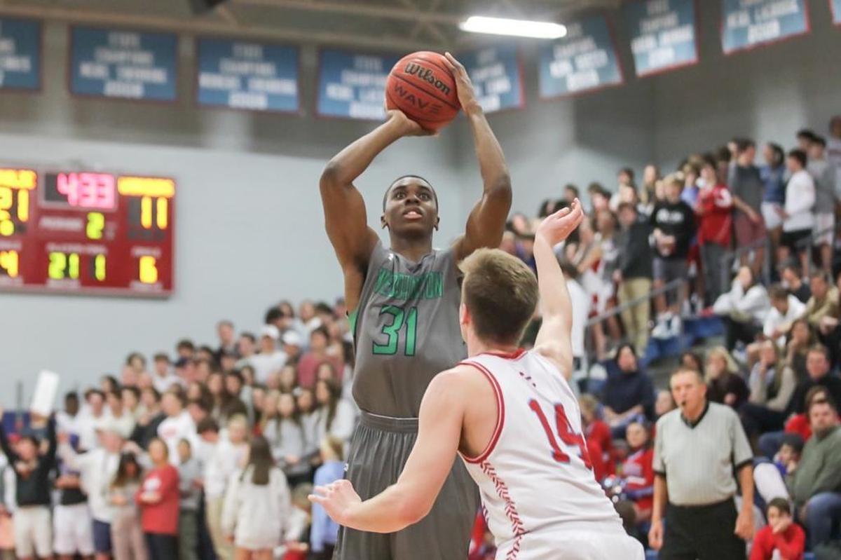Weddington's Caleb Dixon (31) pulls up just inside the 3-point line for two points. Charlotte Catholic defeated Weddington Friday, Jan. 26, 2018.